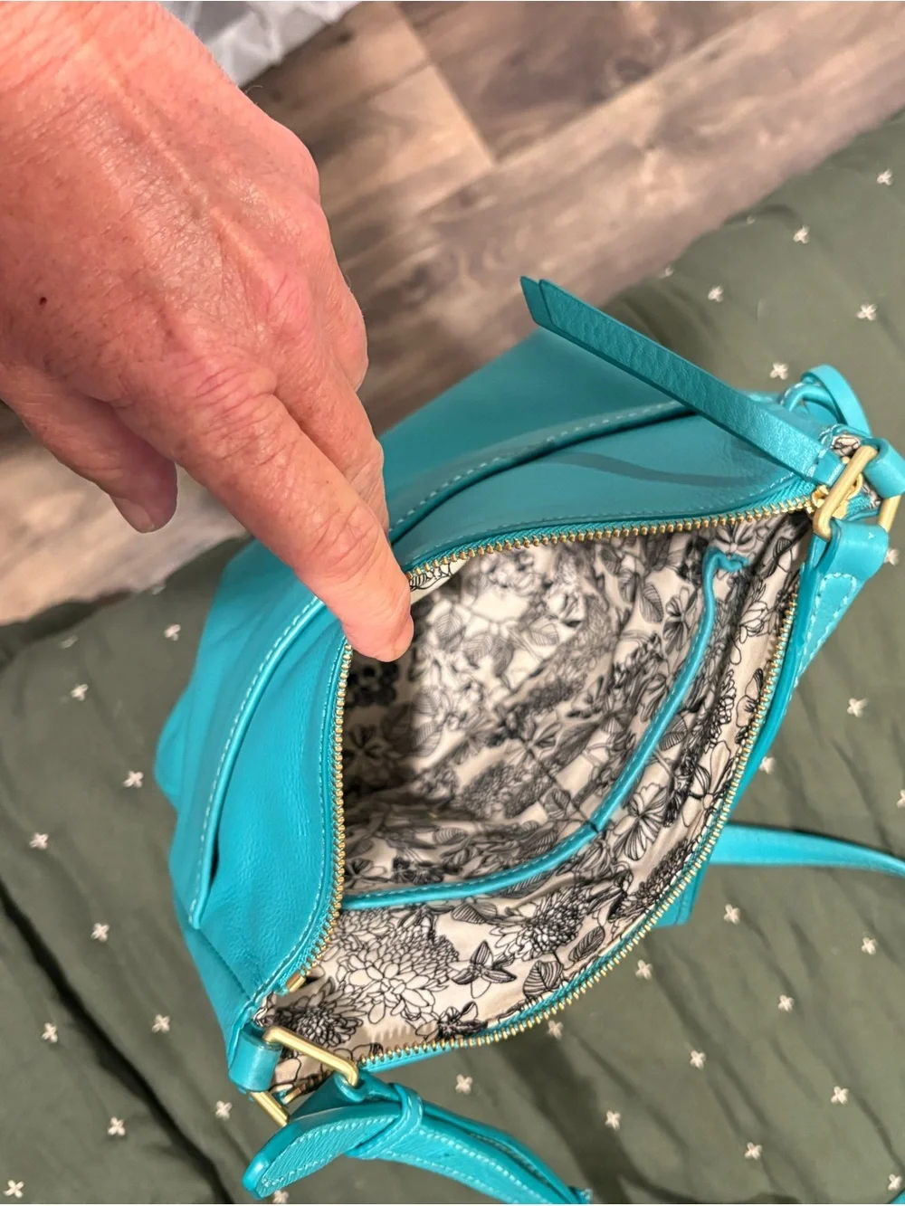 Vera Bradley (3 bags) two are quilted one is leather.